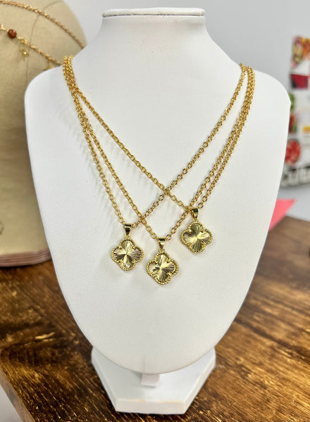 Golden clover leaf necklace