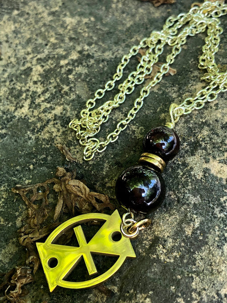 Mmere Dane Adinkra charm and Red Garnet pendant