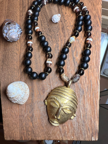 African ancestor mask pendant with black onyx, smoky quartz, and DZI agate