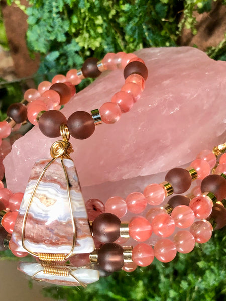 Pink tourmaline, glass beads and crazy lace agate pendant