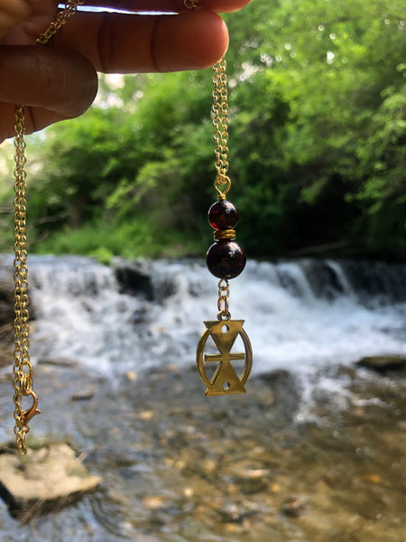 Mmere Dane Adinkra charm and Red Garnet pendant