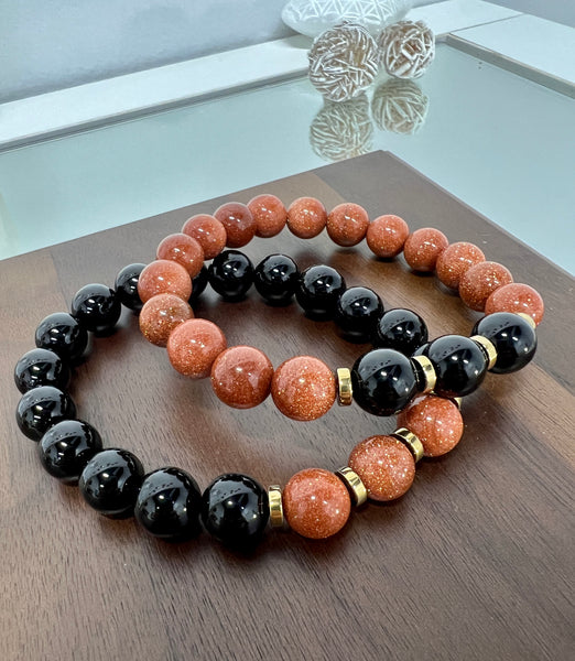 Black onyx & gold sandstone couple set