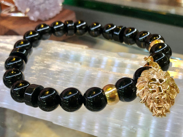Black onyx 10mm and 18k gold covered lion charm