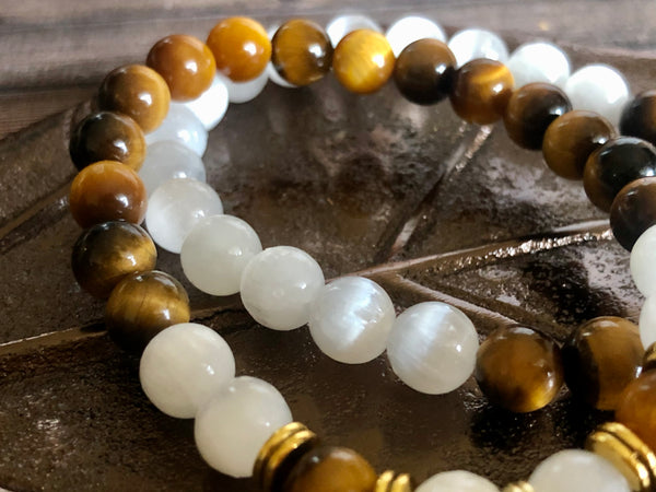 “Love never loses its way home” Tiger eye & Selenite