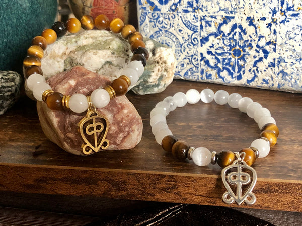“Love never loses its way home” Tiger eye & Selenite