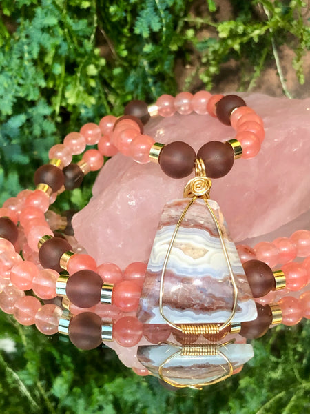 Pink tourmaline, glass beads and crazy lace agate pendant