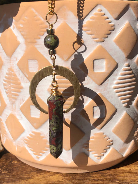 Dragon blood Jasper point pendant and crescent moon.