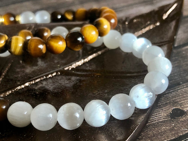 “Love never loses its way home” Tiger eye & Selenite