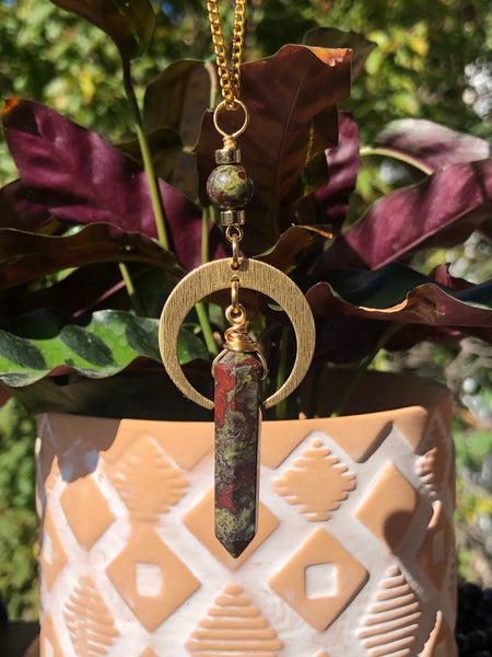 Dragon blood Jasper point pendant and crescent moon.