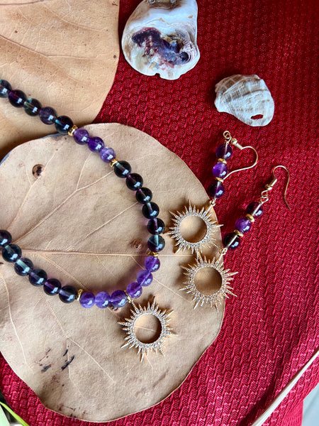 Fluorite and amethyst with sun pendant