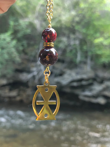 Mmere Dane Adinkra charm and Red Garnet pendant