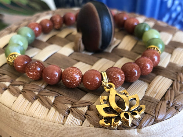 Gold Sandstone & green Jade 8mm with Unique Lotus charm.