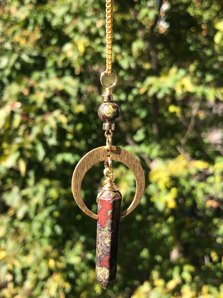 Dragon blood Jasper point pendant and crescent moon.