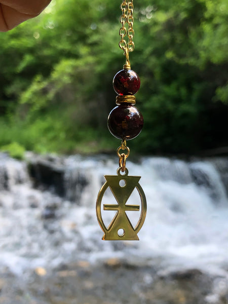 Mmere Dane Adinkra charm and Red Garnet pendant