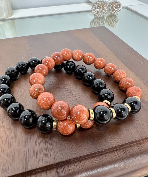 Black onyx & gold sandstone couple set