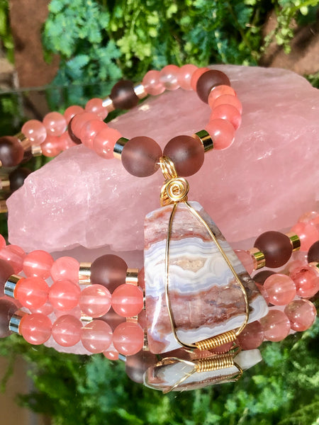 Pink tourmaline, glass beads and crazy lace agate pendant