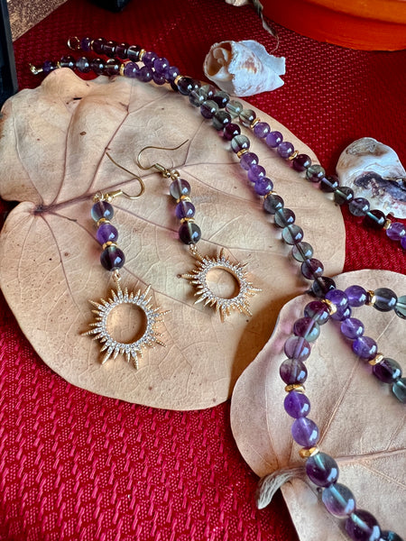 Fluorite and amethyst with sun pendant