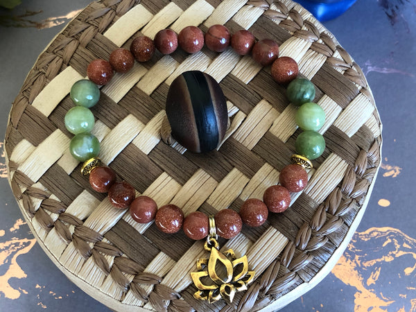 Gold Sandstone & green Jade 8mm with Unique Lotus charm.