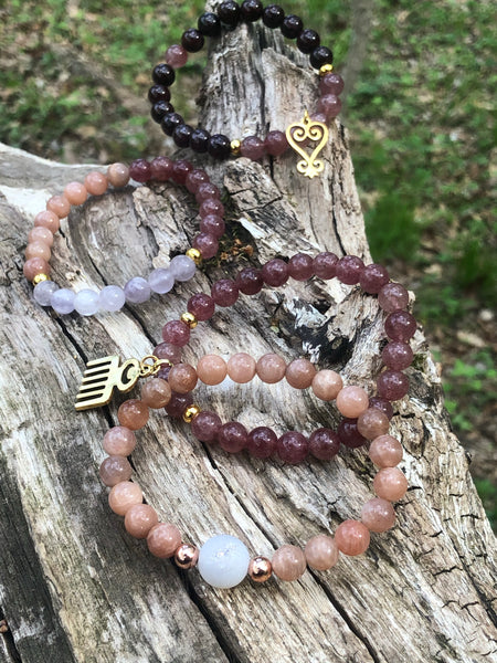 Adinkra Charm & Strawberry Quartz bracelet