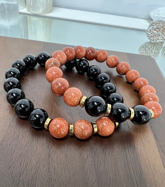 Black onyx & gold sandstone couple set