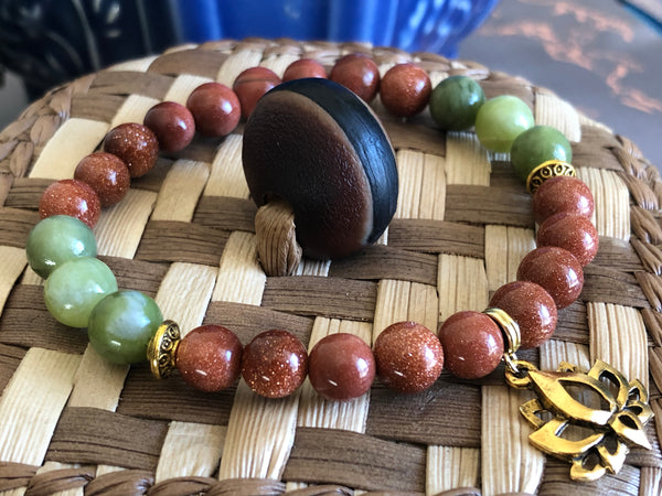 Gold Sandstone & green Jade 8mm with Unique Lotus charm.