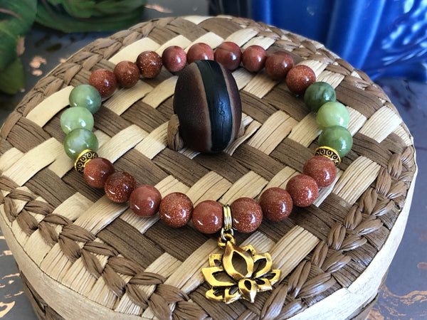 Gold Sandstone & green Jade 8mm with Unique Lotus charm.