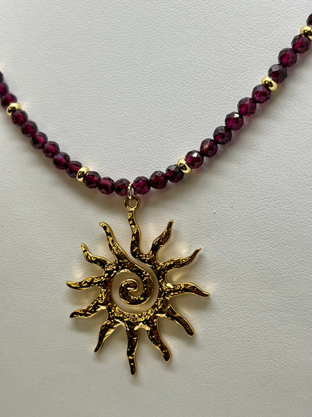 Spiral sun pendant necklace