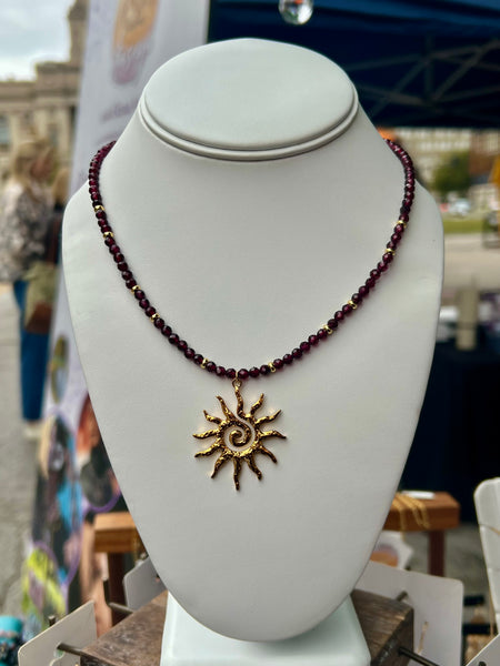 Spiral sun pendant necklace