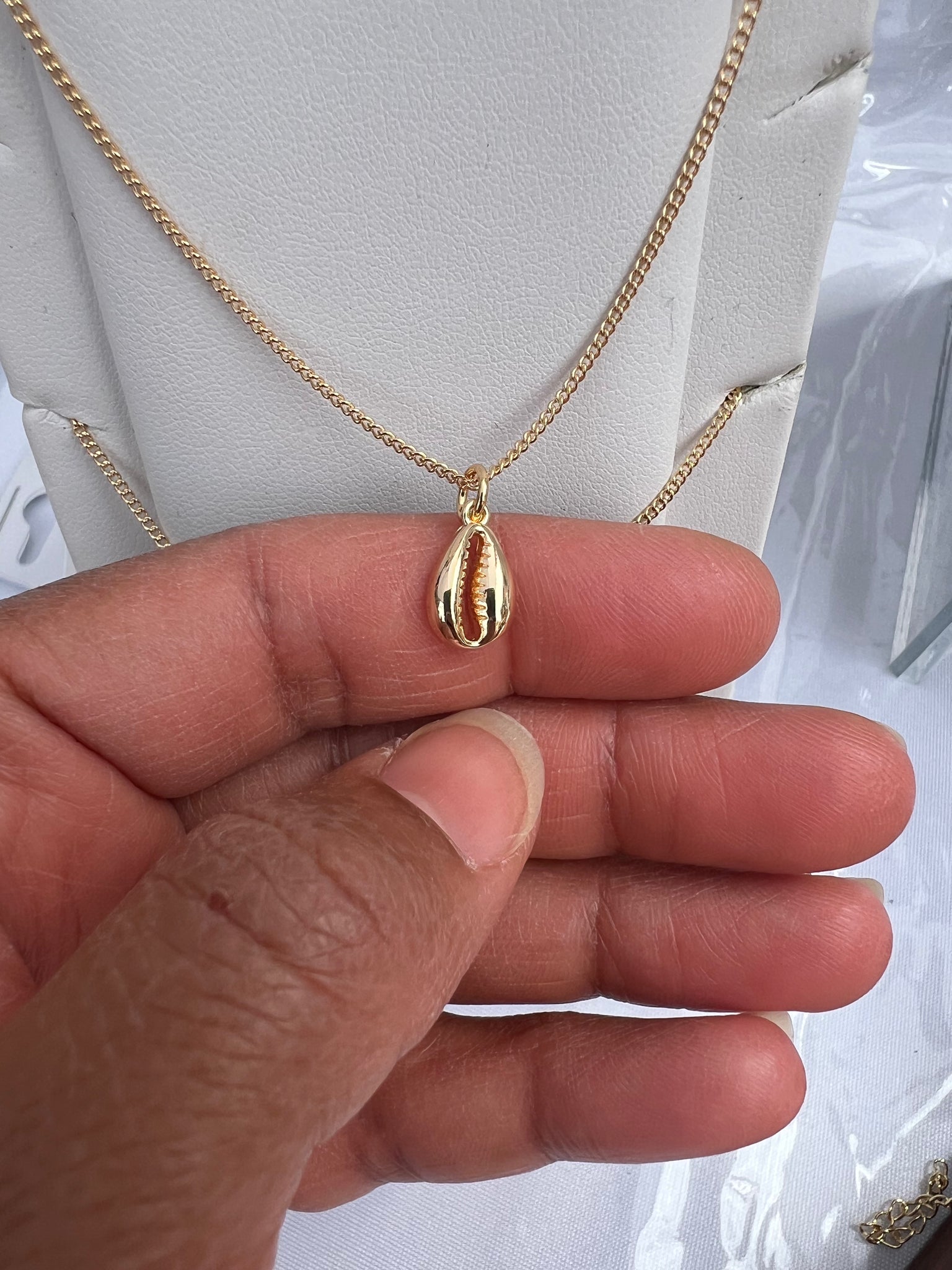 Cowrie shell golden necklace