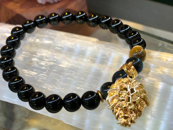 Black onyx 10mm and 18k gold covered lion charm