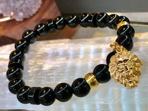 Black onyx 10mm and 18k gold covered lion charm
