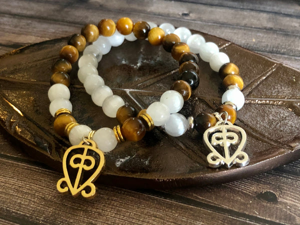 “Love never loses its way home” Tiger eye & Selenite