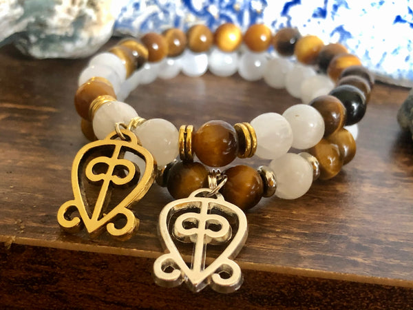 “Love never loses its way home” Tiger eye & Selenite