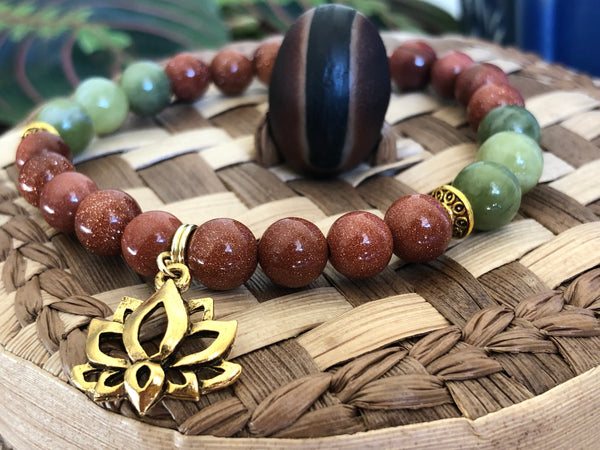 Gold Sandstone & green Jade 8mm with Unique Lotus charm.