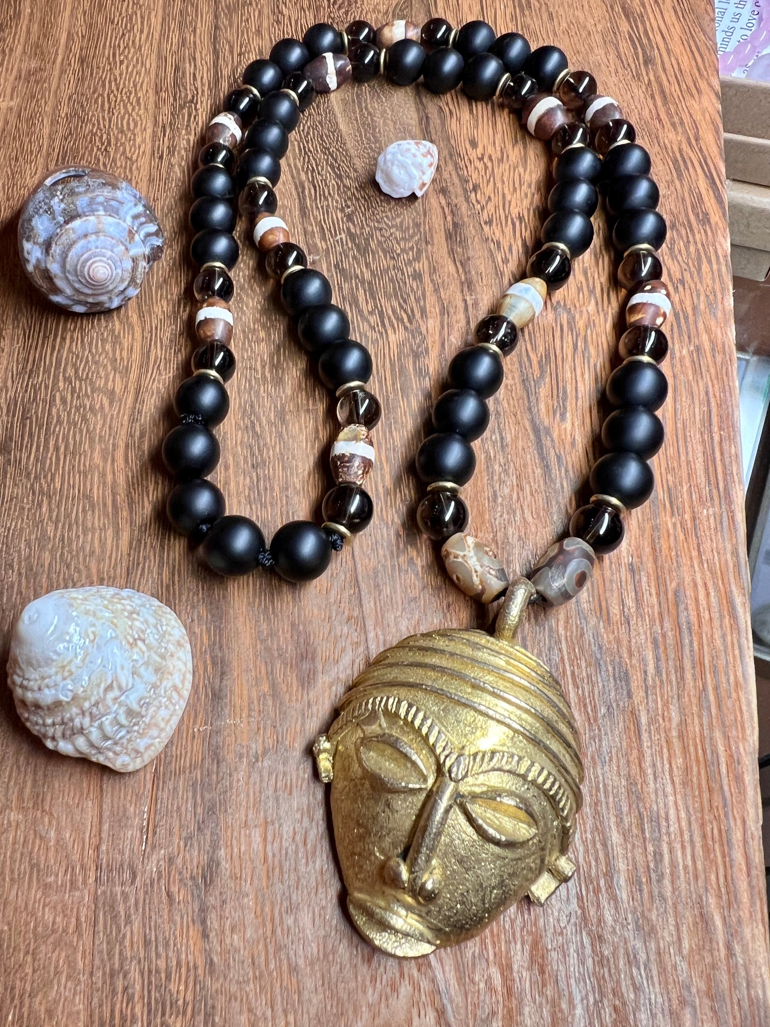 African ancestor mask pendant with black onyx, smoky quartz, and DZI agate