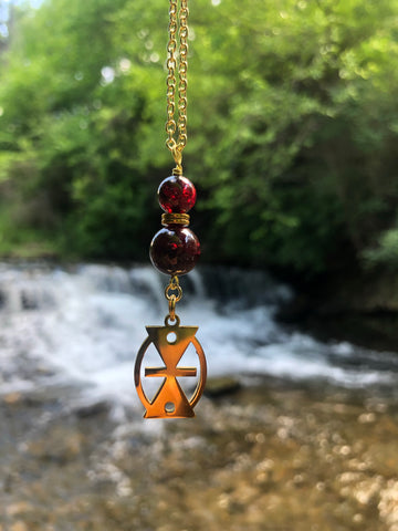 Mmere Dane Adinkra charm and Red Garnet pendant